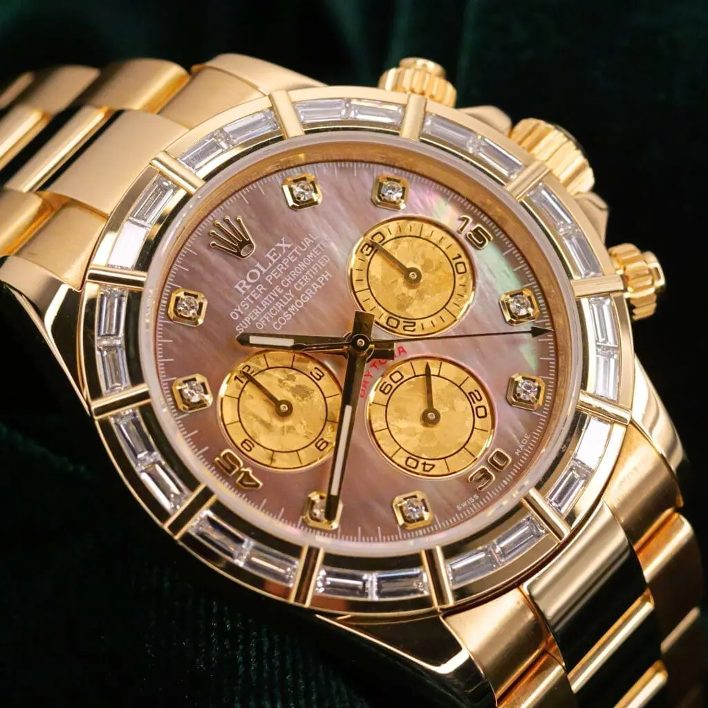 Rolex Daytona Cosmograph Mother-of-Pearl Diamond Dial Diamond Baguette Bezel Yellow Gold 40mm MINT CONDITION COMPLETE SET 116568BR