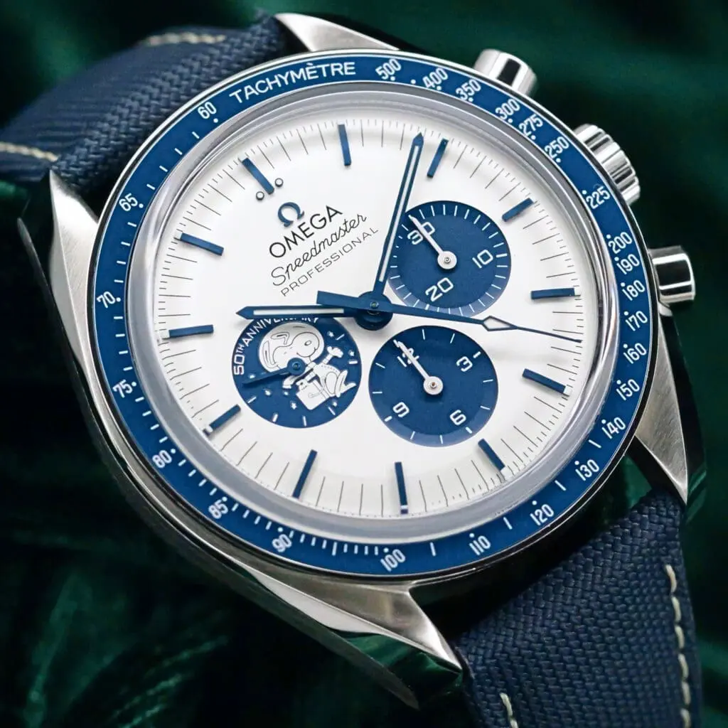 Omega Speedmaster Professional Moonwatch "Silver Snoopy Award" Silver Dial Blue Ceramic Bezel Blue Nylon Strap Stainless Steel 42mm MINT CONDITION COMPLETE SET 310.32.42.50.02.001