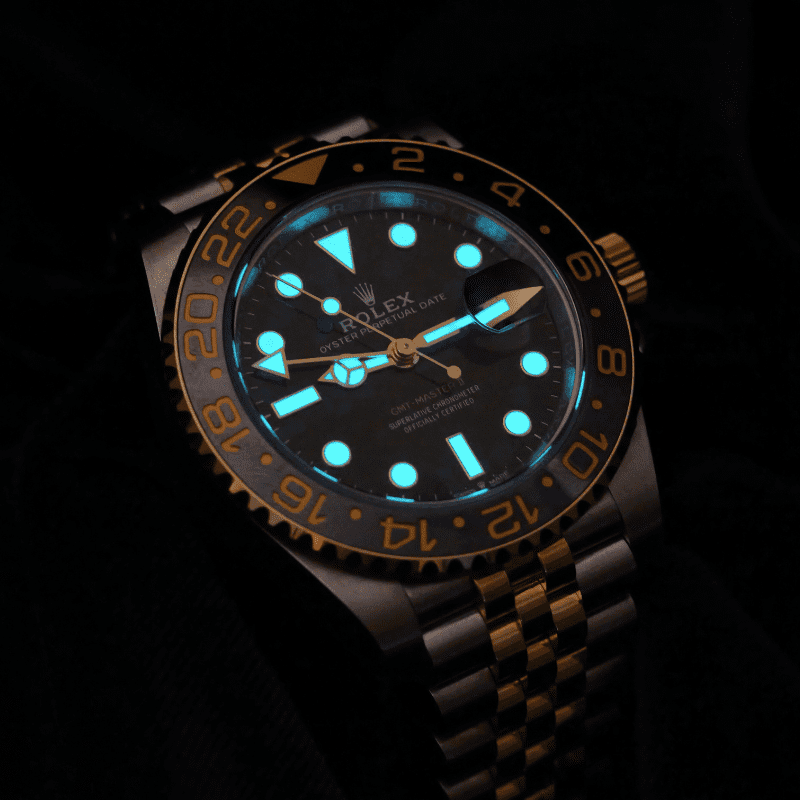 Rolex 126713GRNR GMT-Master II Bumblebee front melt angled 1 lume