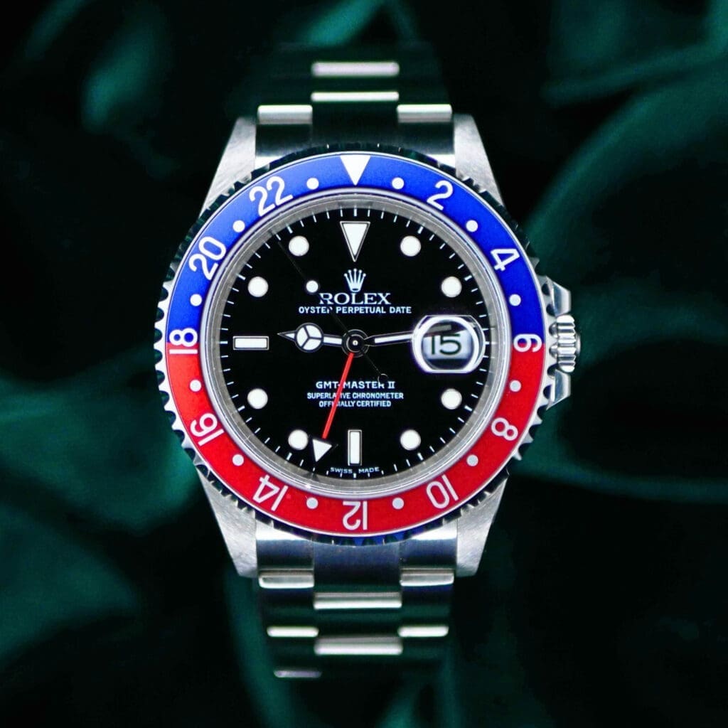 Rolex GMT-Master II "Pepsi" Black Dial Red Blue Bezel 40MM Stainless Steel COMPLETE SET MINT 16710