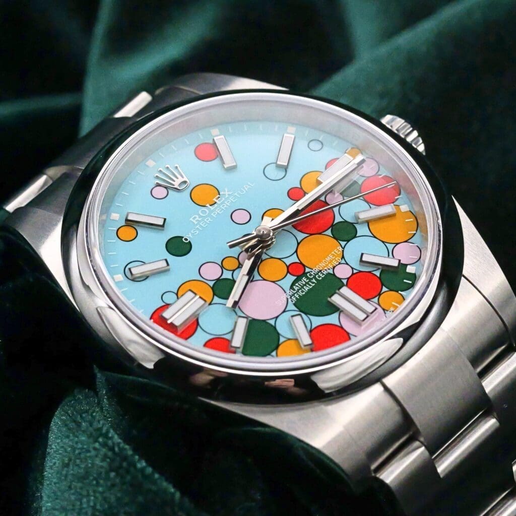 Rolex Oyster Perpetual 41 "Celebration" Turquoise Multi-color Dial Steel Bezel Oyster Steel Bracelet Stainless Steel 41mm MINT CONDITION COMPLETE SET 124300