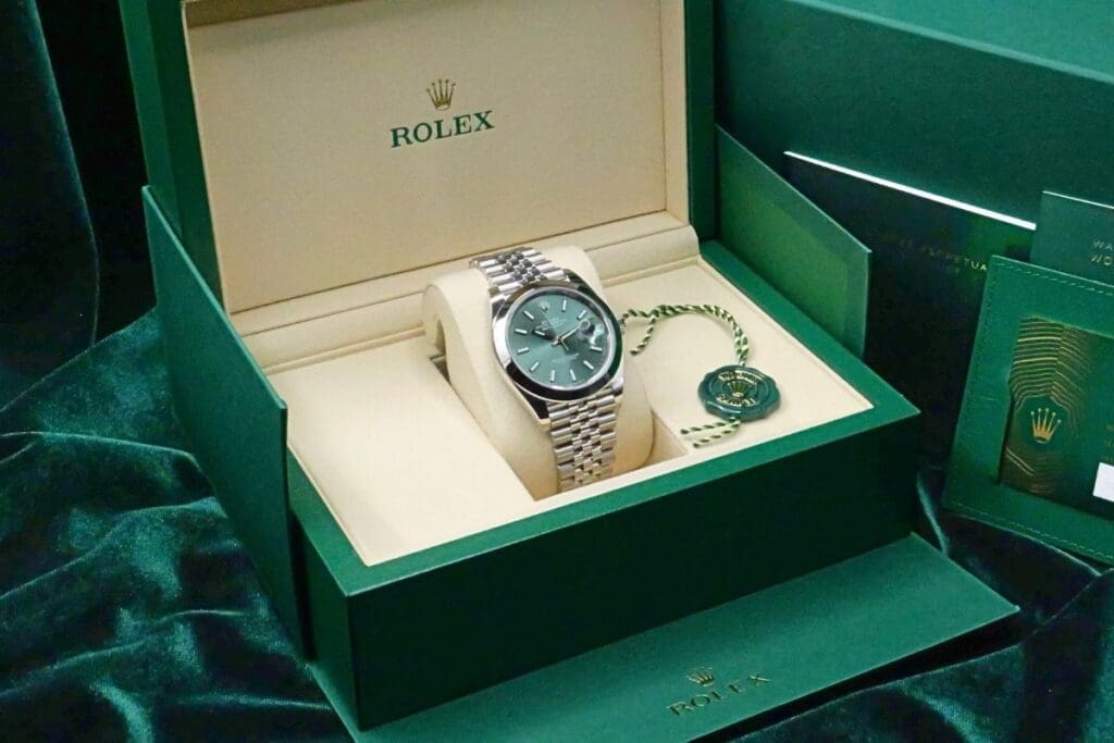 rolex datejust on a rolex box