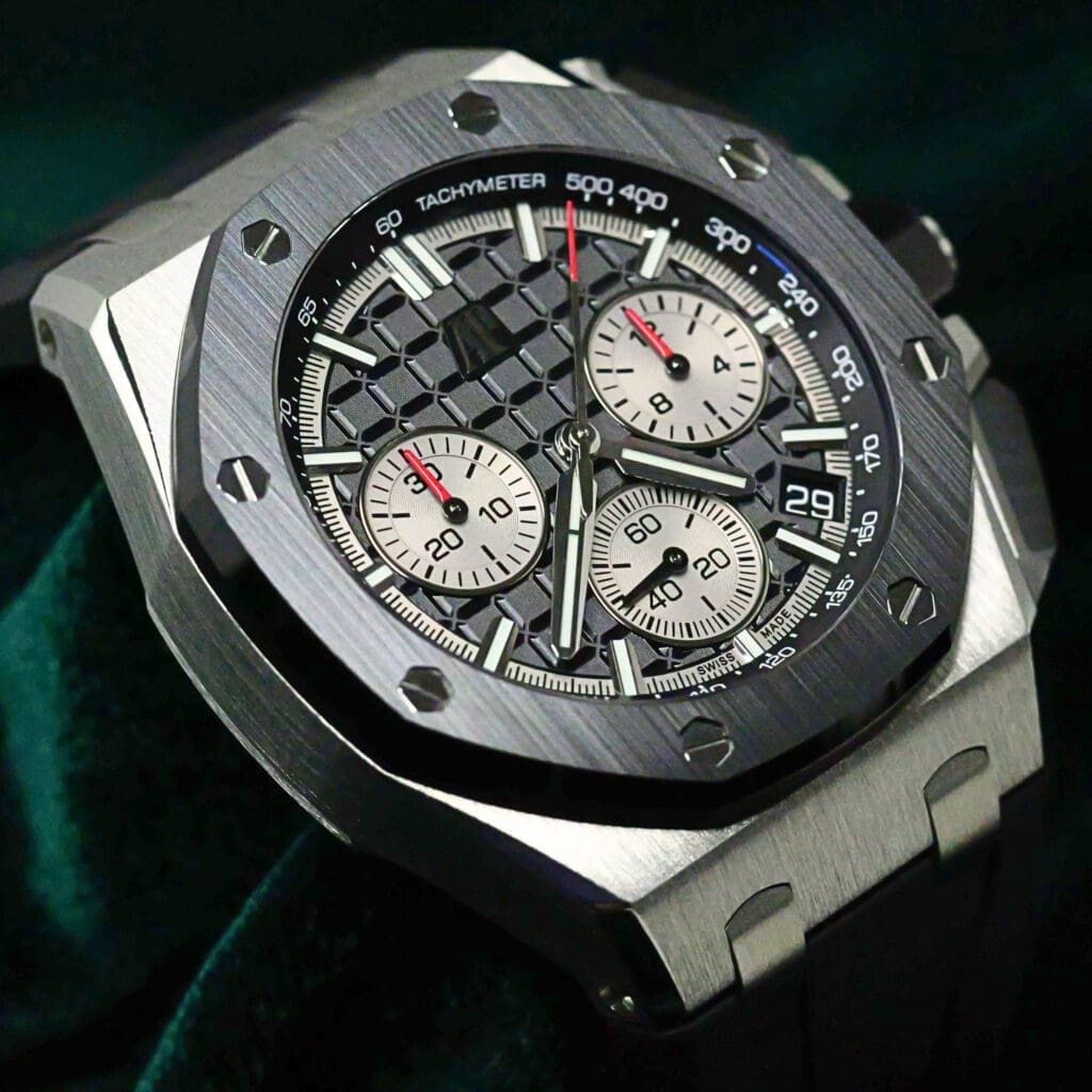 Audemars Piguet Royal Oak Offshore Chronograph Black Dial White Sub Dials Black Ceramic Bezel Black Rubber Strap Stainless Steel 43mm MINT CONDITION COMPLETE SET 26420SO.OO.A002CA.01