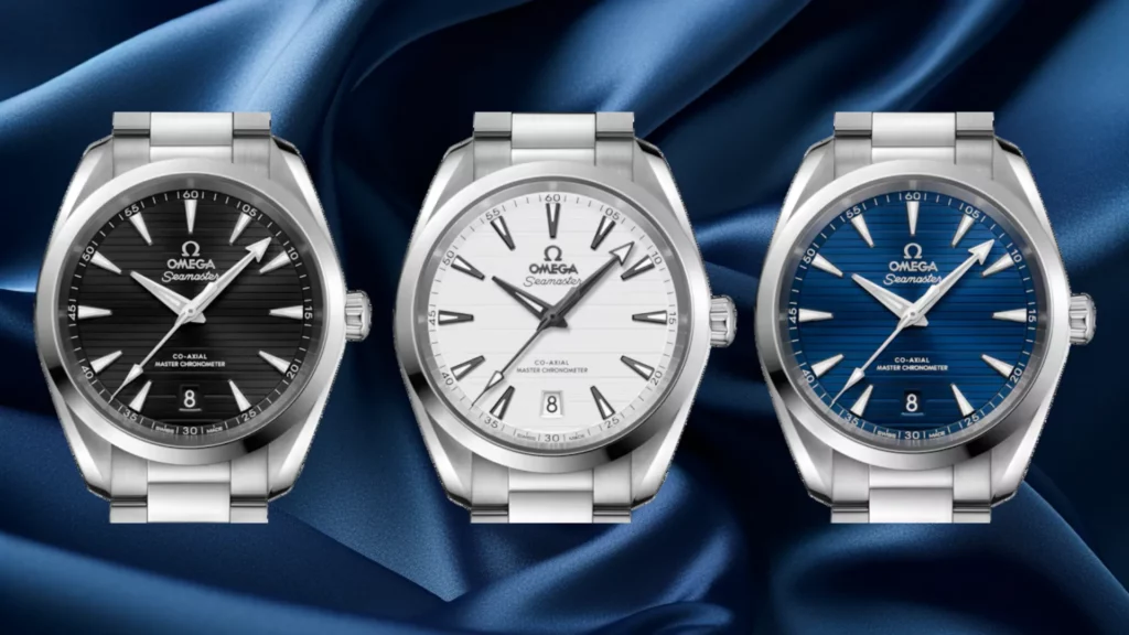 Omega Aqua Terra 38mm in black, silver, and blue dial side by side on steel bracelets