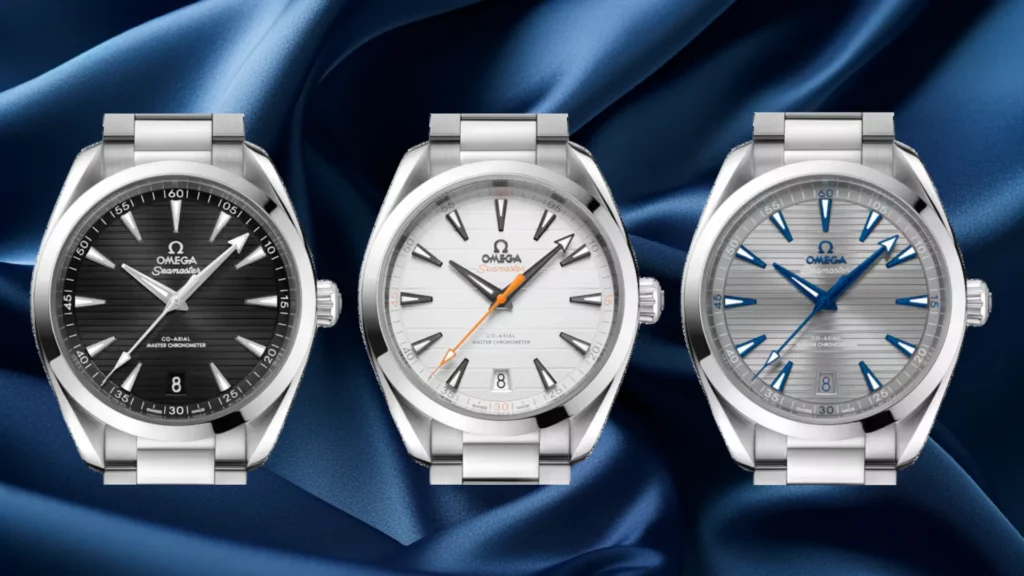 Omega Aqua Terra 41mm in black, silver with orange accents, and grey with blued hands side by side
