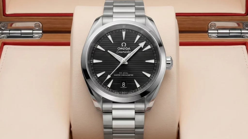 Omega Aqua Terra 38mm black dial on steel bracelet inside Omega wooden box