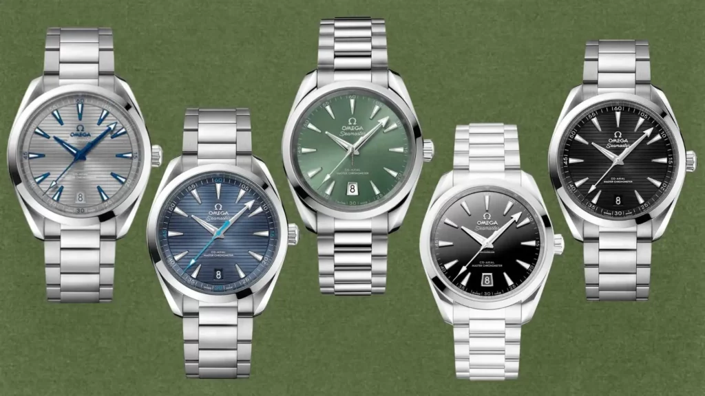 A collection of five Omega Seamaster Aqua Terra 150M watches with various dial colors, including teak grey, shades of blue, green, and black. All models feature the signature arrow hands, date window at 6 o'clock, and Master Chronometer movements.
