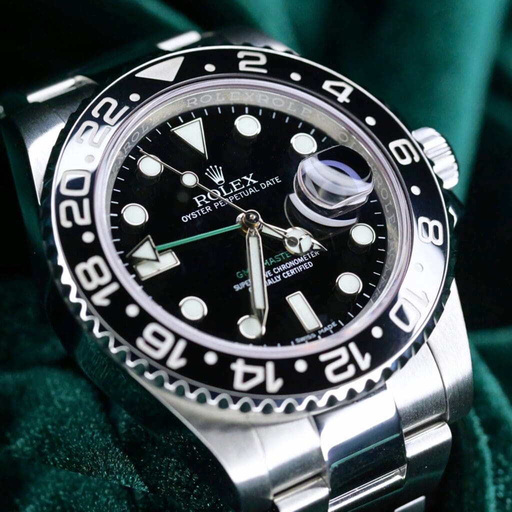 Rolex GMT-MASTER II Black Ceramic Bezel Black Dail Green GMT Oyster Bracelet Stainless Steel 40mm MINT CONDITION COMPLETE SET 116710LN