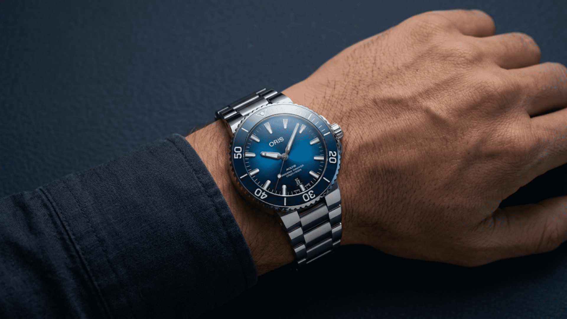 Oris Aquis on a mans arms