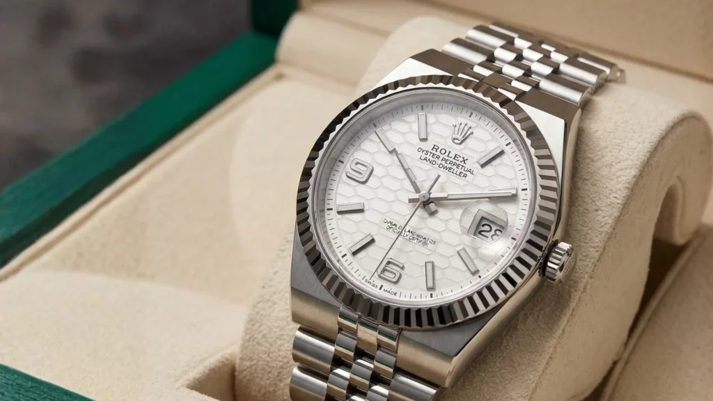 Rolex Land-Dweller white honeycomb dial with fluted bezel on Jubilee bracelet inside green Rolex box