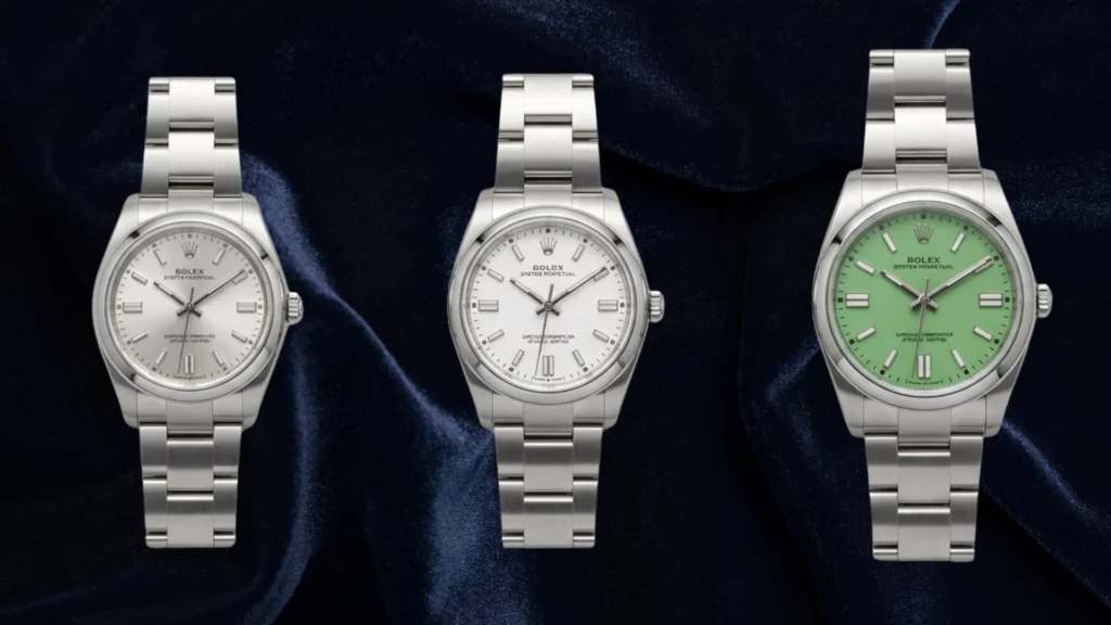 Rolex Oyster Perpetual in silver, white, and mint green dial on steel Oyster bracelets on dark blue velvet