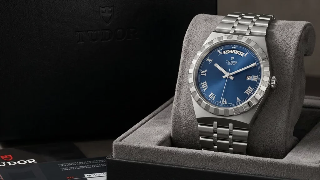 Tudor Royal blue dial with day-date on steel bracelet inside Tudor presentation box