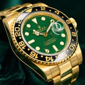 Rolex GMT-Master II Green Dial Black Ceramic Bezel Oyster Bracelet 18K Yellow Gold 40mm MINT CONDITION COMPLETE SET 116718LN