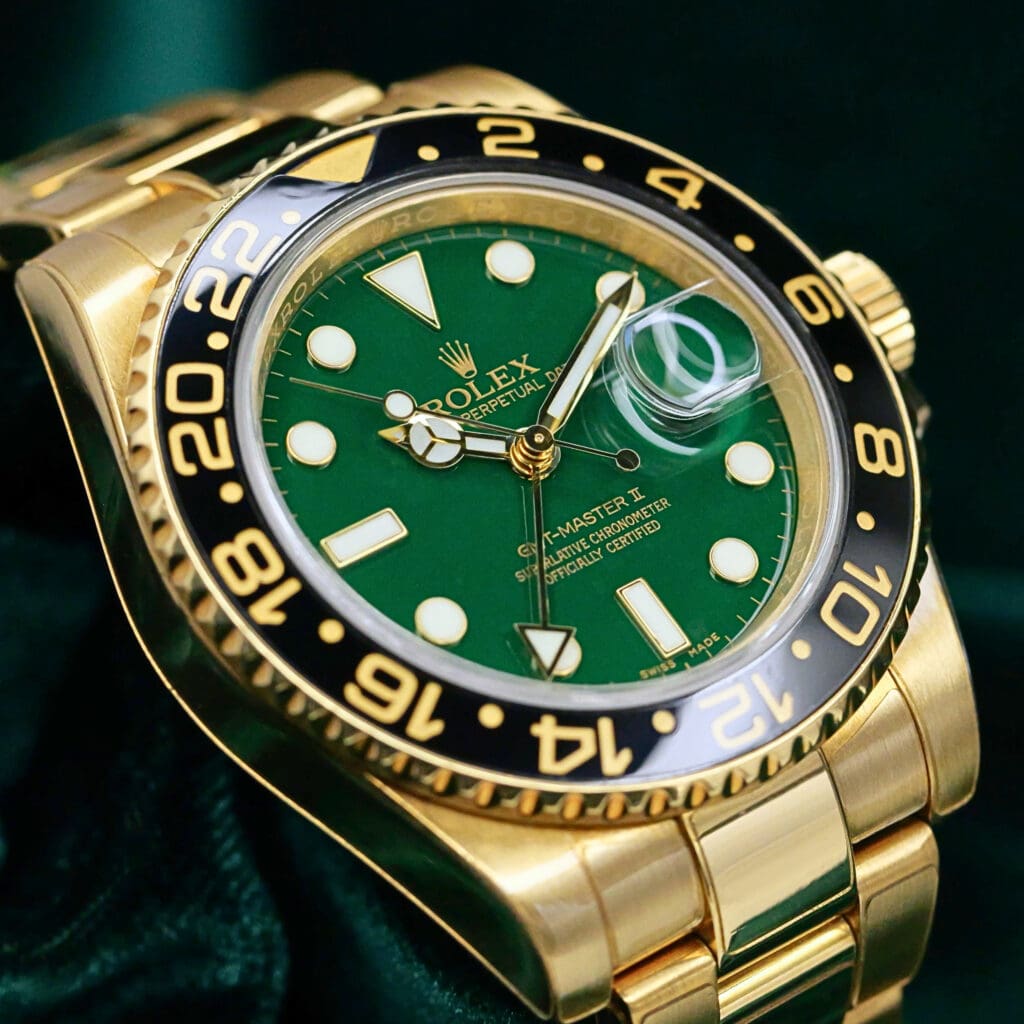 Rolex GMT-Master II Green Dial Black Ceramic Bezel Oyster Bracelet 18K Yellow Gold 40mm MINT CONDITION COMPLETE SET 116718LN