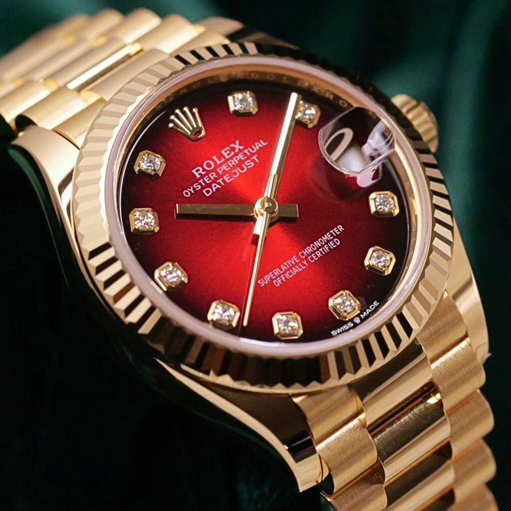 2026 NEW UNWORN Rolex Datejust 31 Red Ombre Dial Diamond Markers Fluted Bezel President Bracelet 18K Yellow Gold COMPLETE SET 278278