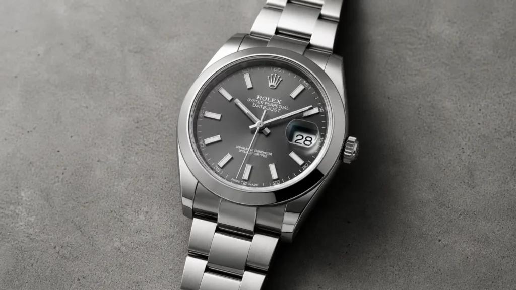 Rolex Datejust 41 with rhodium grey dial and smooth bezel on Oyster bracelet on grey concrete