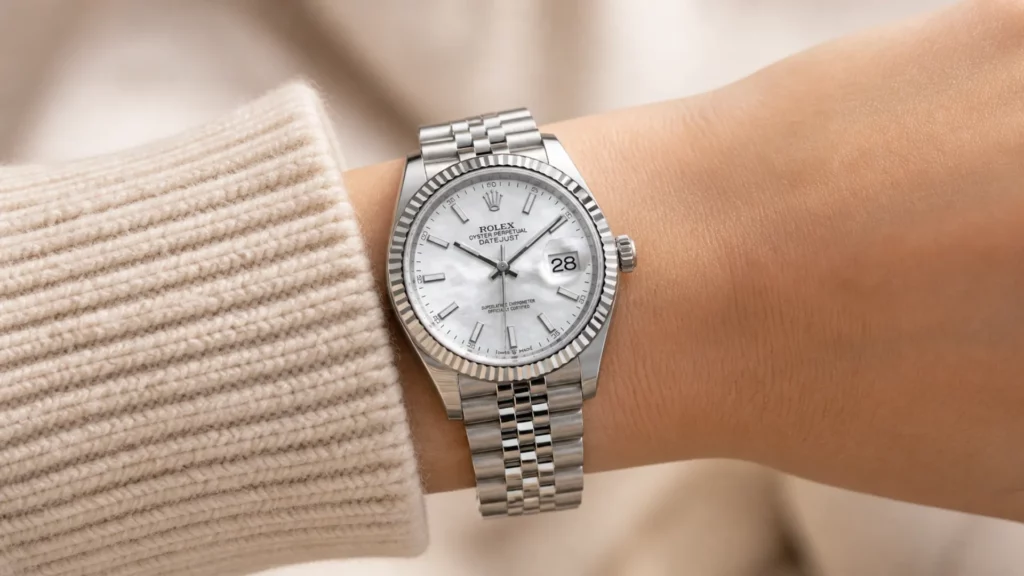 Rolex Datejust 36 with mother of pearl dial and fluted bezel on Jubilee bracelet on woman's wrist