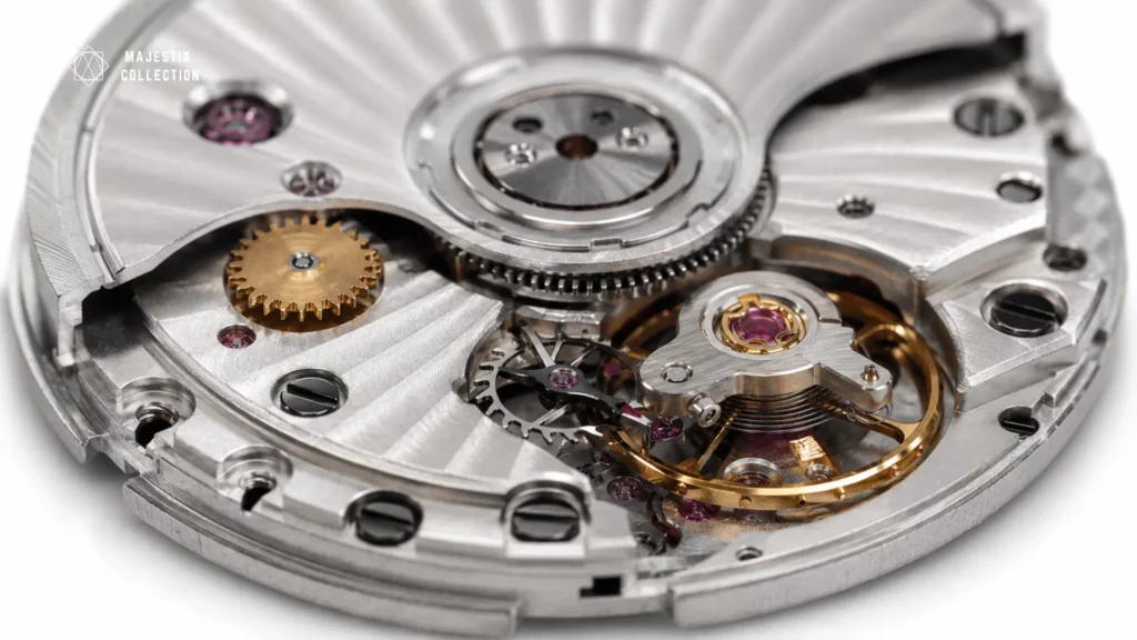 Close-up of an Omega Co-Axial movement showing gears, jewels, and finishing