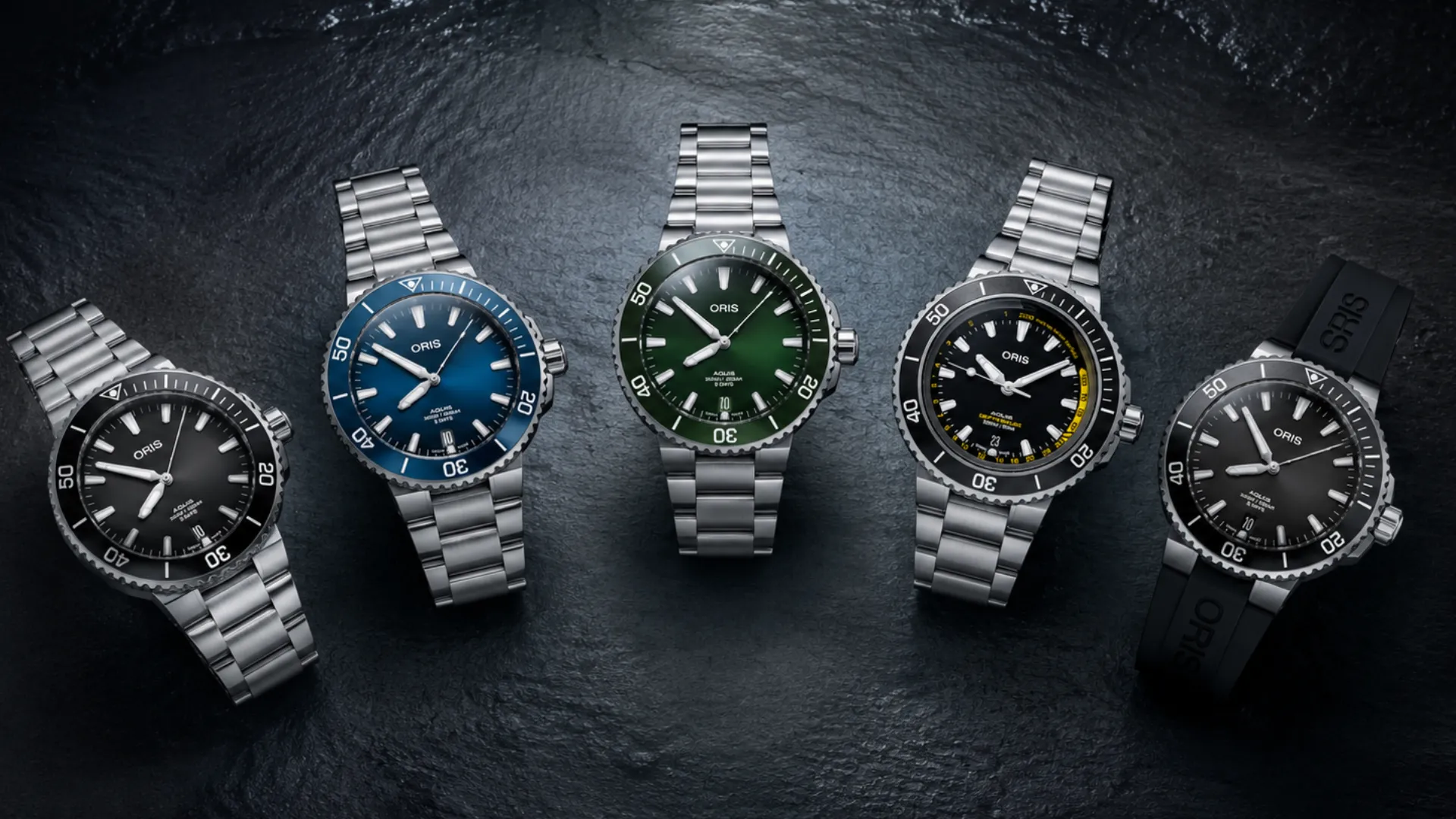 Five Oris Aquis dive watches in different sizes=