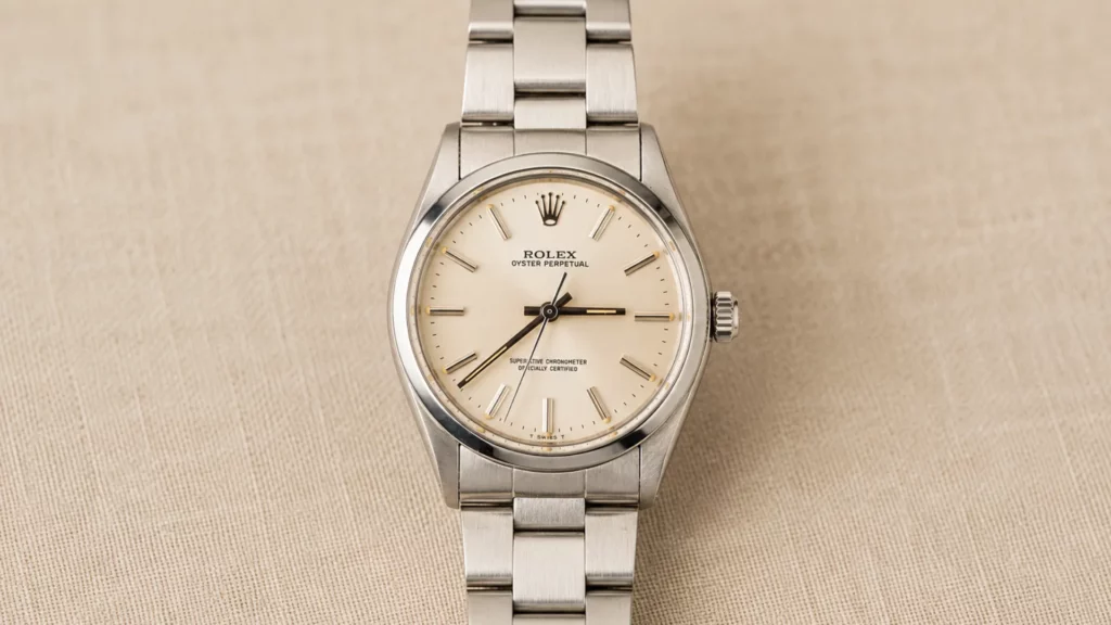 Rolex Oyster Perpetual ref. 1002 vintage buying pick under $5K with clean silver dial and minimalist steel case