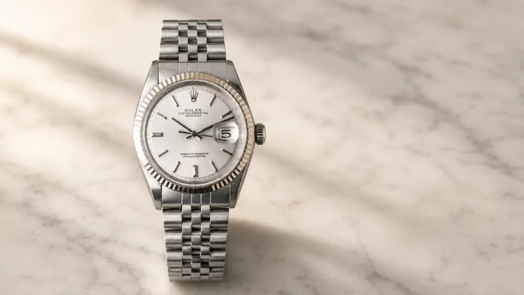 Vintage Rolex Datejust ref. 1601/1603 buying pick under $6K, showing silver dial, fluted bezel, and Jubilee bracelet