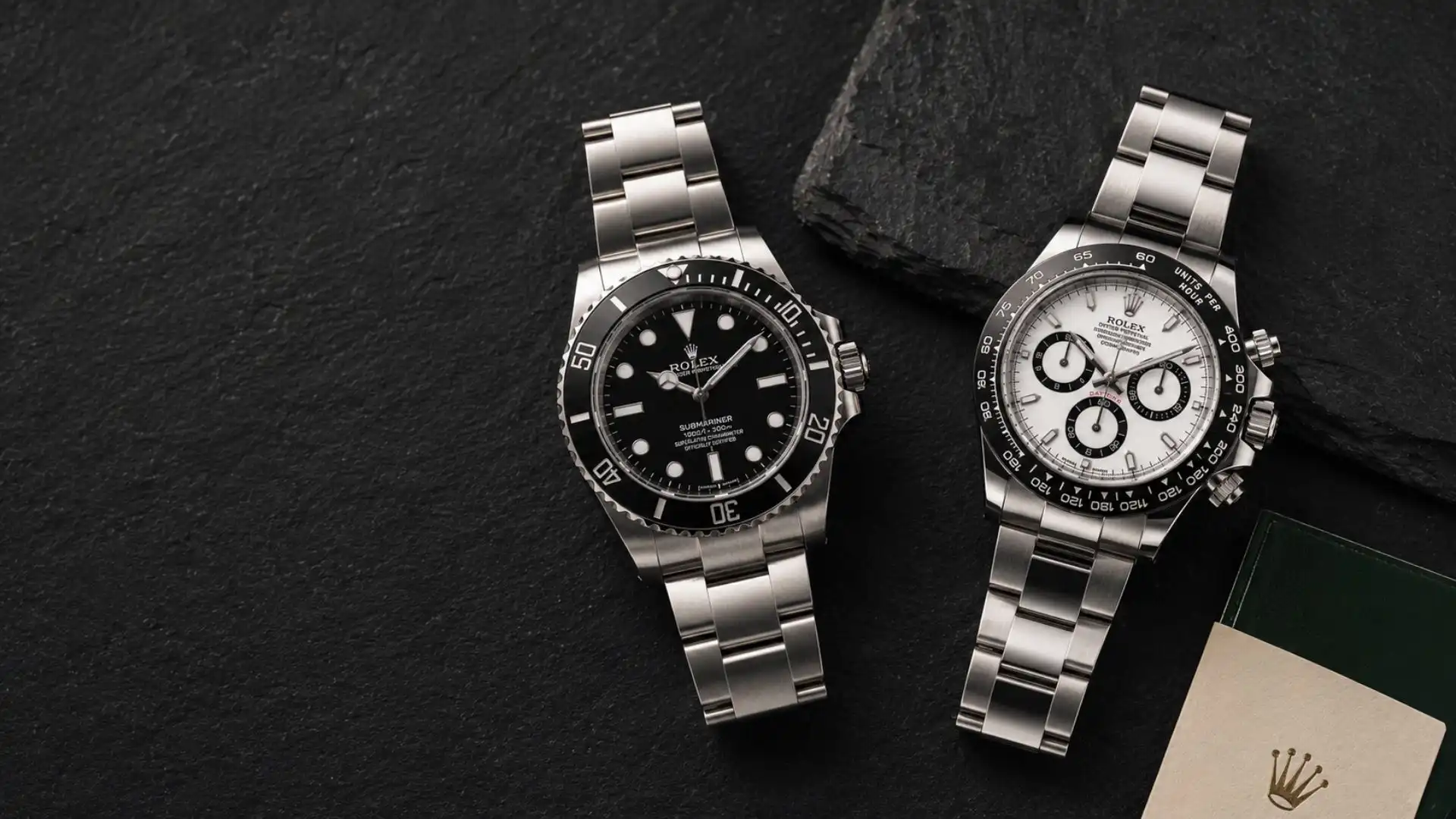 used Rolex watches for sale in 2026 showing Submariner and Daytona on dealer display