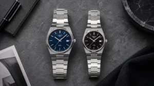 Tissot PRX 40mm Powermatic 80 buying guide — stainless steel bracelet watch on flat lay surface