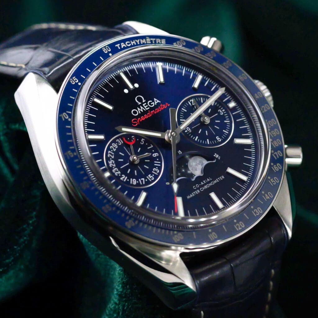 Omega Speedmaster Moonphase Blue Dial Blue Ceramic Bezel Blue Leather Strap Stainless Steel 44.25mm MINT CONDITION COMPLETE SET 304.33.44.52.03.001