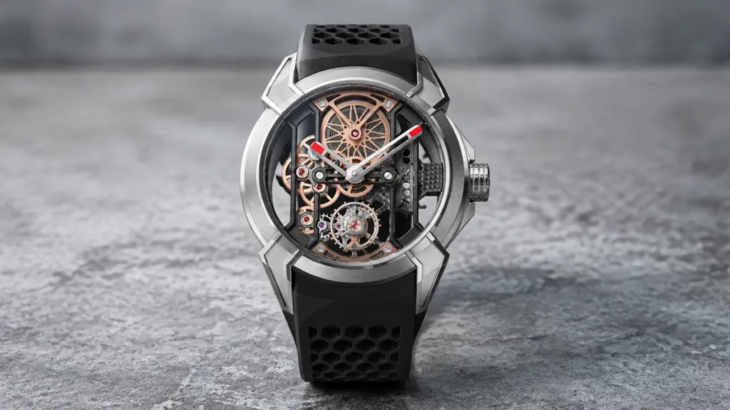 Jacob & Co. Epic X titanium skeleton watch with exposed tourbillon and rose gold movement on grey concrete