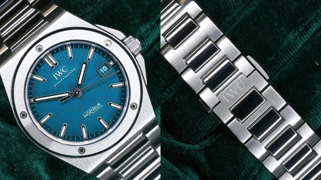 Close-up of IWC Ingenieur Automatic 40 with blue grid-textured dial beside engraved integrated steel bracelet on green velvet
