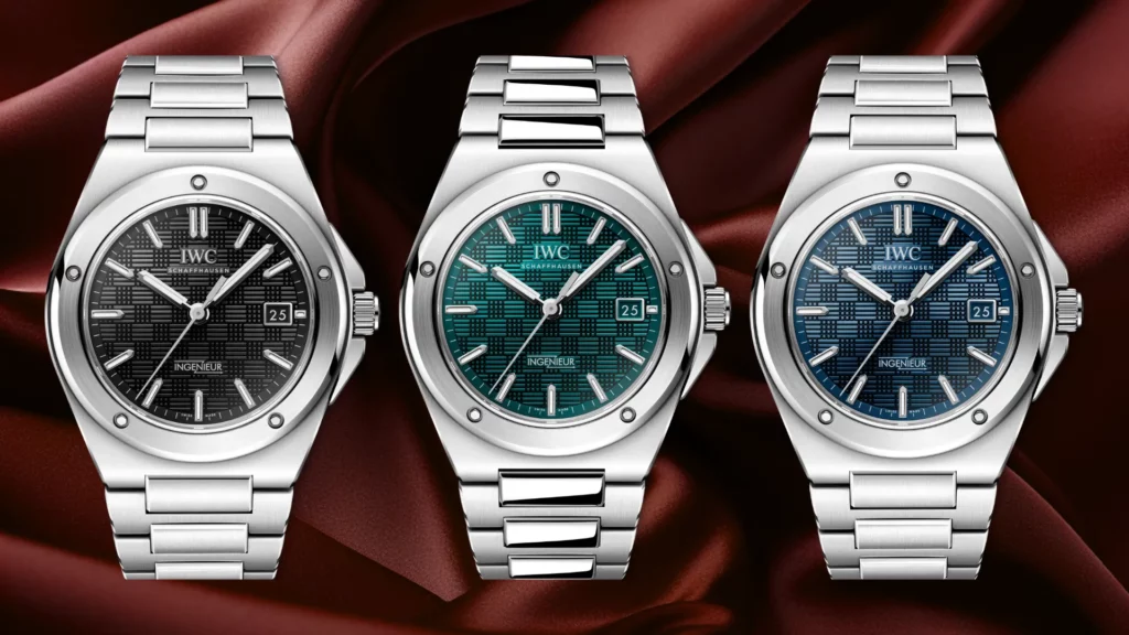 Three IWC Ingenieur references with black, green, and blue grid-textured dials on red silk