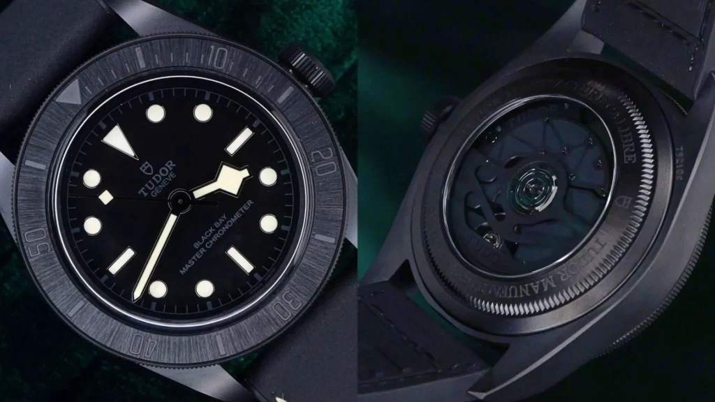 Close-up of Tudor Black Bay Ceramic with matte black dial beside skeletonized caseback on green velvet
