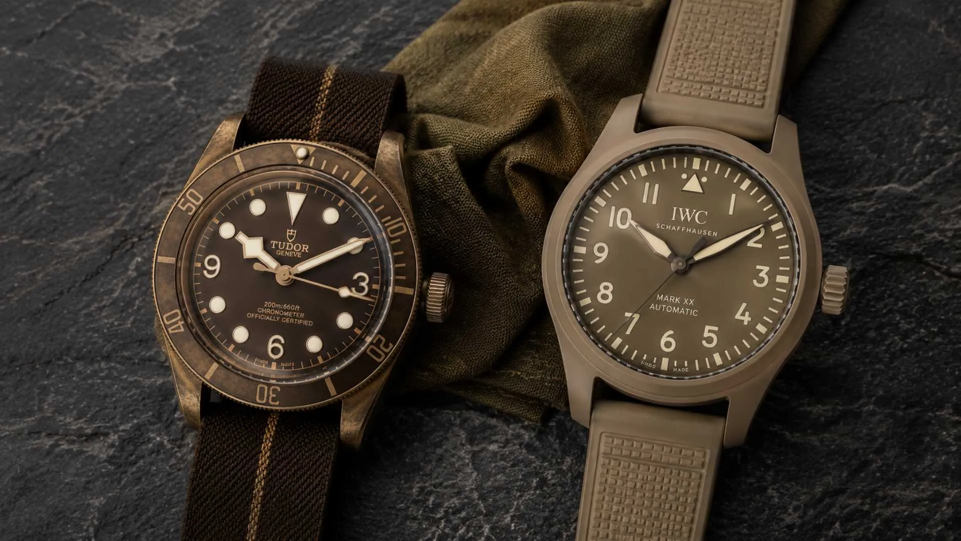 A bronze watch and a sand ceramic pilot watch side by side on a slate surface — best tan watches
