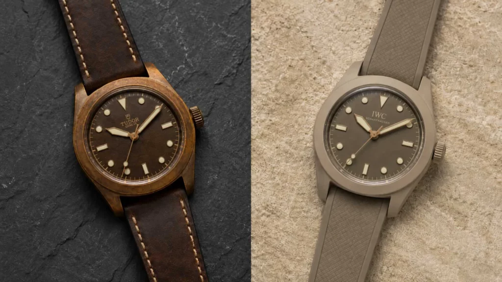 Bronze watch with patina next to a sand ceramic watch on stone — bronze vs ceramic tan watch comparison
