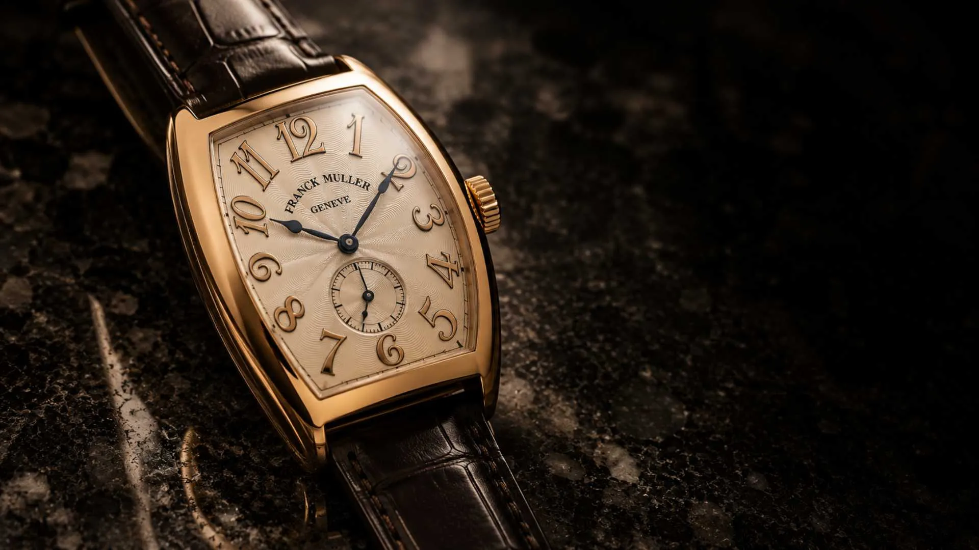 Franck Muller Cintrée Curvex luxury watch close-up showing tonneau case and Art Deco numerals
