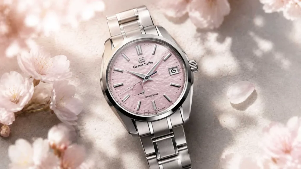  Grand Seiko SBGA413 Shunbun pink dial macro showing textured cherry blossom depth and Spring Drive seconds hand