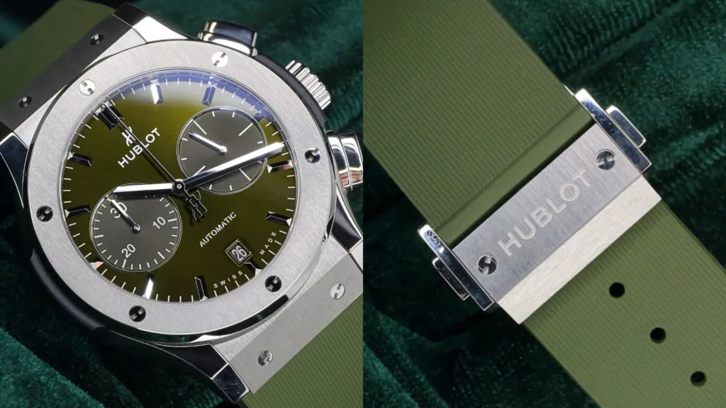 Hublot Classic Fusion chronograph with green dial beside close-up of its green rubber strap with Hublot keeper on dark green velvet