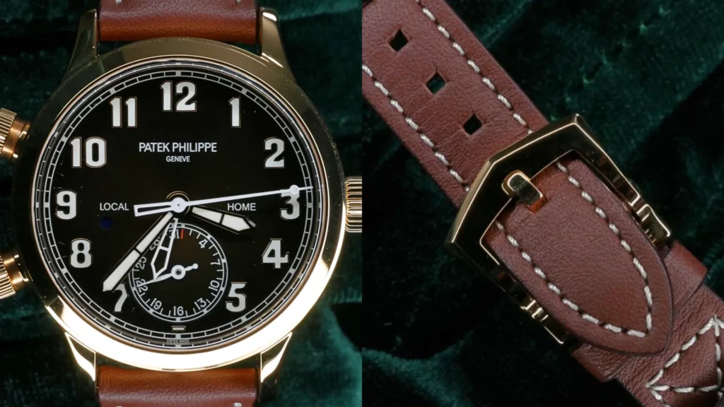 Rose gold Patek Philippe Calatrava Pilot Travel Time with black dial on a brown leather strap, alongside its buckle, on green velvet