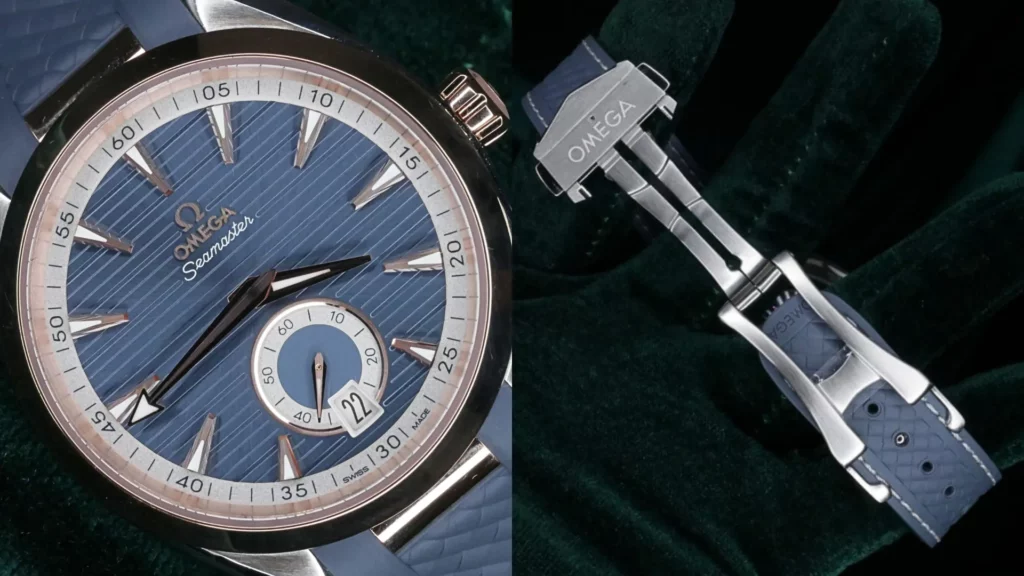 Omega Seamaster Aqua Terra 150M with blue teak dial and small seconds beside close-up of its blue strap and deployant clasp on dark green velvet