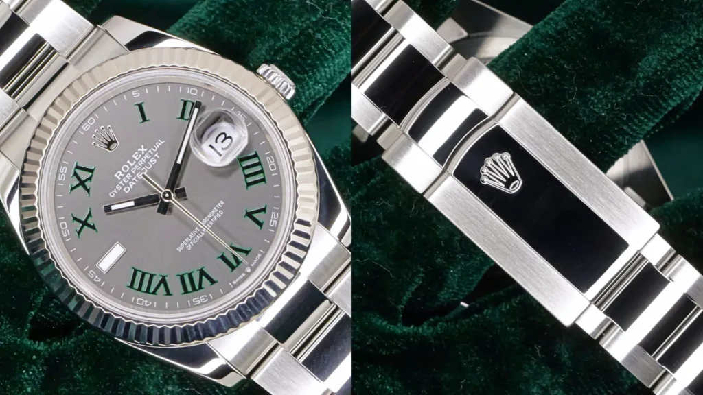 Steel Rolex Datejust 41 with slate Wimbledon dial and green Roman numerals close-up beside its Oyster bracelet on green velvet