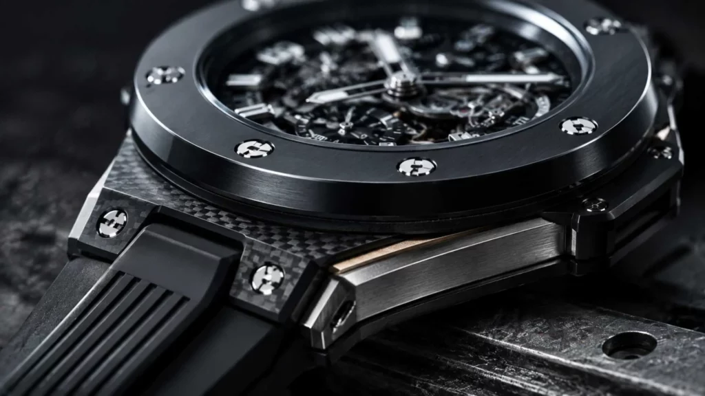 Hublot Big Bang case detail showing ceramic bezel, carbon fiber, titanium and King Gold Art of Fusion materials
