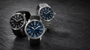 IWC Aquatimer buying guide 2026 featuring several Aquatimer dive watch references arranged on dark stone