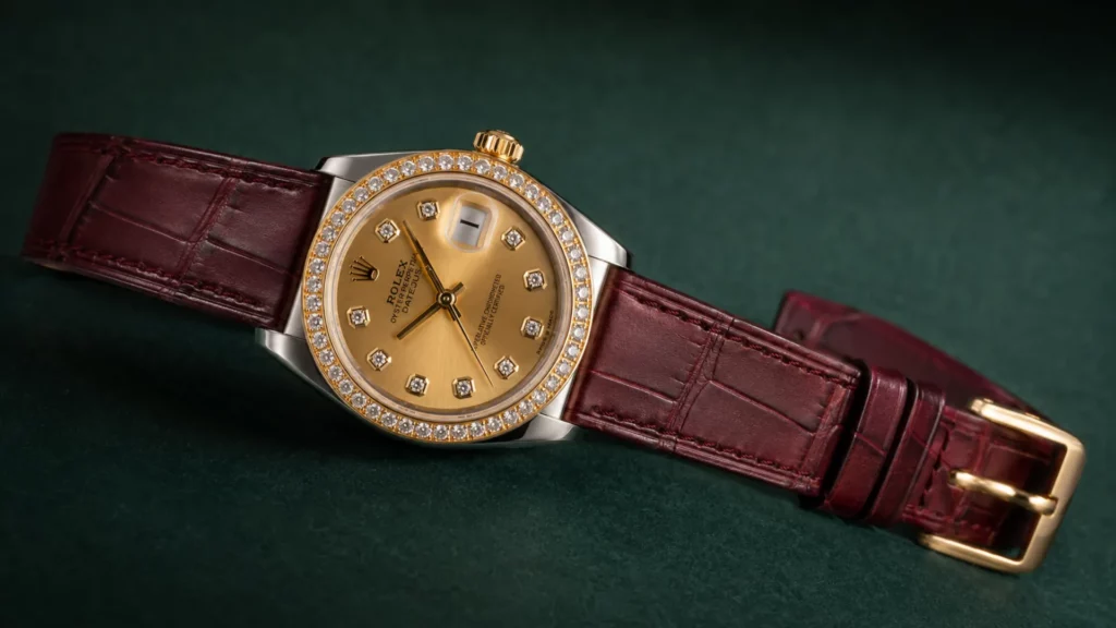 Rolex Datejust 31 278383RBR champagne diamond dial on slim oxblood dress strap with gold buckle
