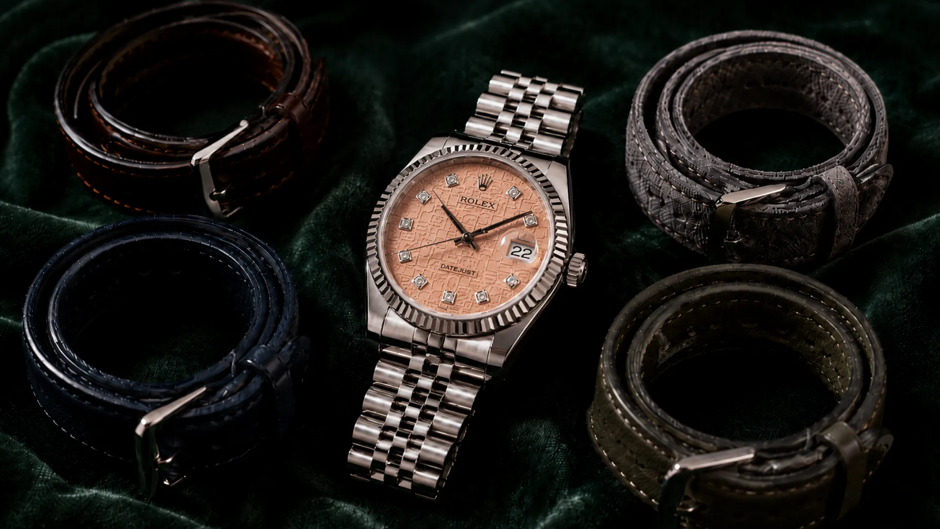 Pink Jubilee dial Datejust with diamond markers surrounded by navy, brown, gray suede and olive straps
