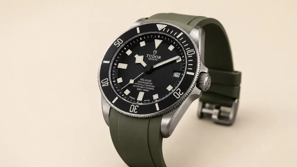 Tudor Pelagos black dial titanium watch on an olive rubber strap, a sharp strap color for a titanium case