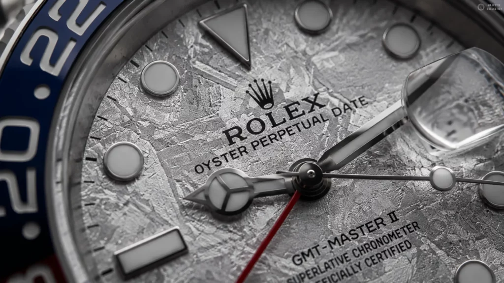 Close-up of a white gold Rolex GMT-Master II meteorite dial showing its crystalline Widmanstätten pattern