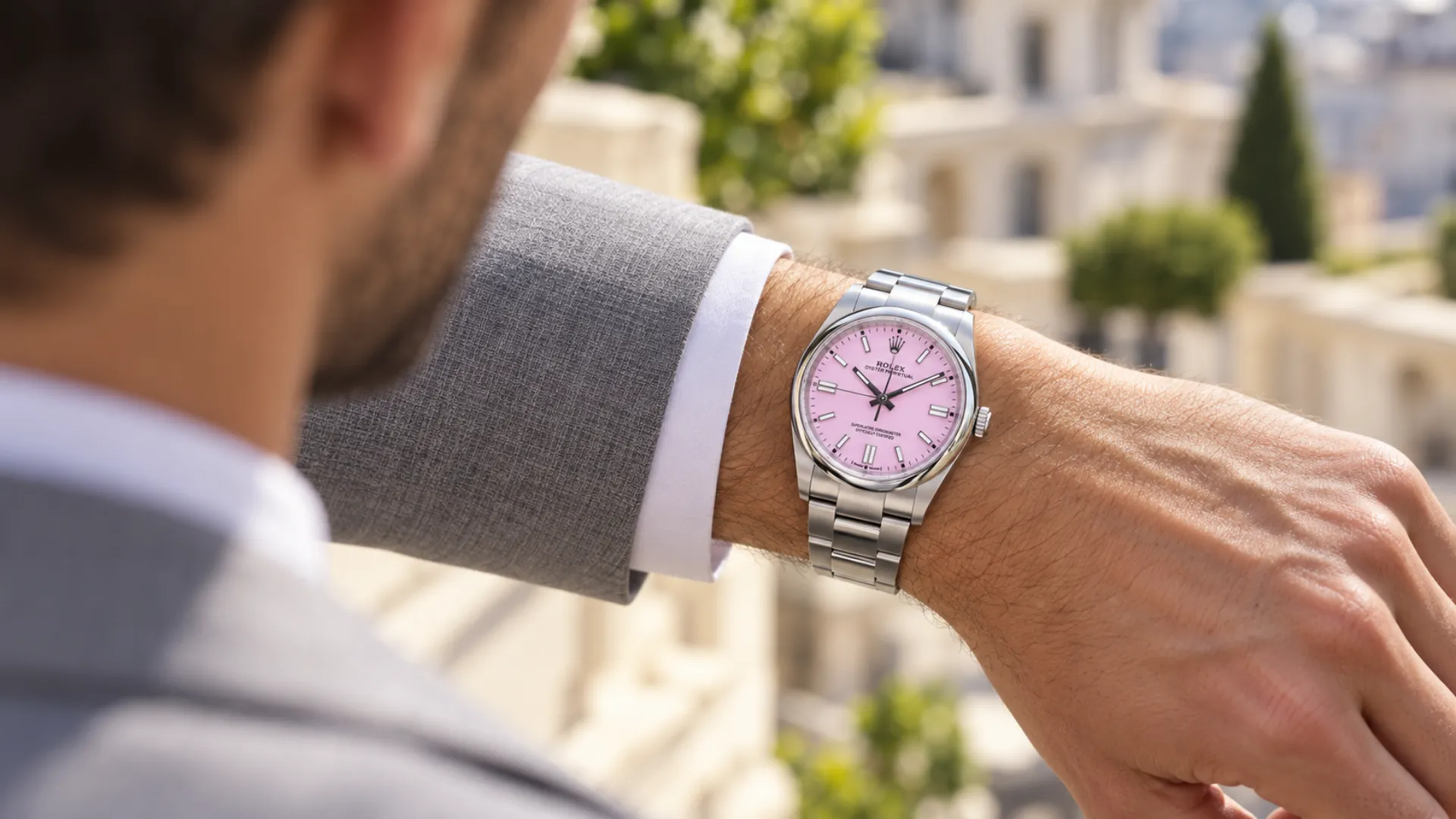 Pink dial watch styled with a navy outfit, showing outfit combinations for a pink dial